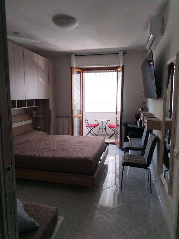 Postel nebo postele na pokoji v ubytování RIU b&b ALGHERO