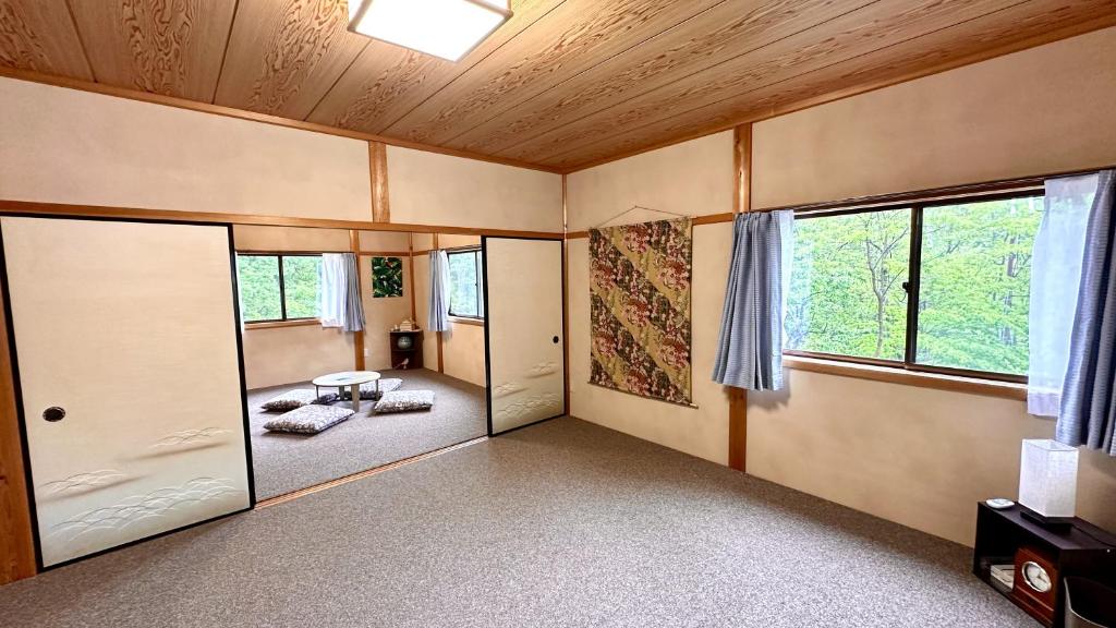 白山麓の隠れ宿Takeoにあるベッド