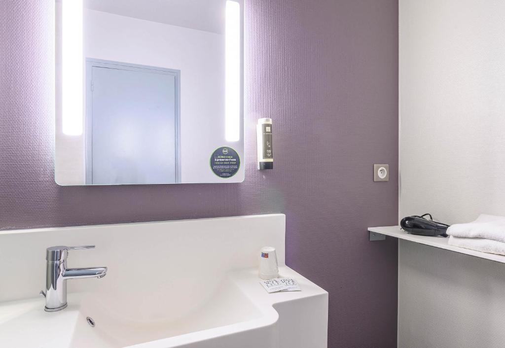 Koupelna v ubytování B&B HOTEL Orange
