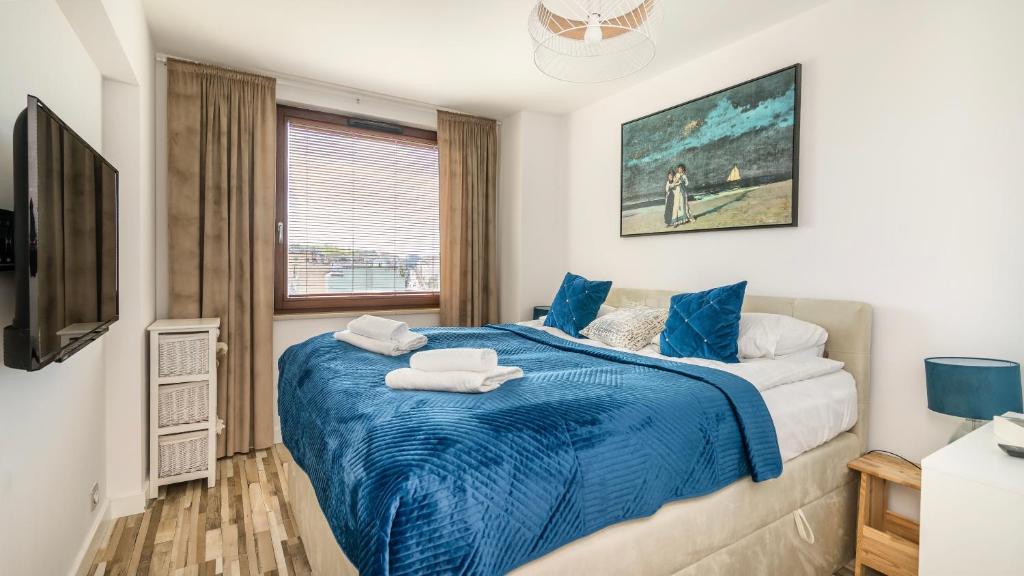 Postel nebo postele na pokoji v ubytování Comfy Apartments - Transatlantyk Lux