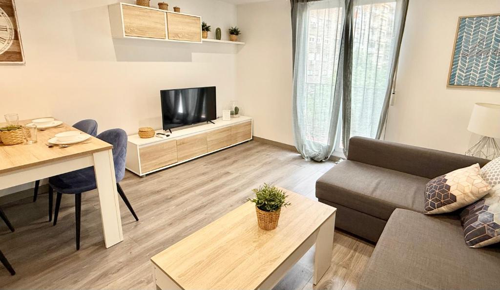 TV a/nebo společenská místnost v ubytování Apartamento Ramon Pignatelli