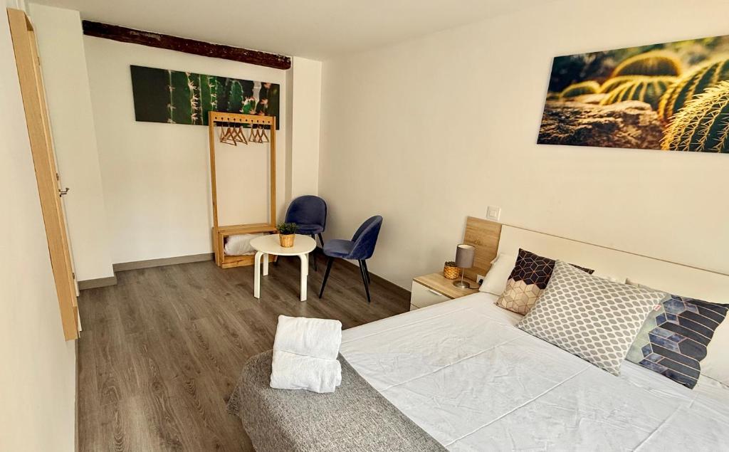 Postel nebo postele na pokoji v ubytování Apartamento Ramon Pignatelli