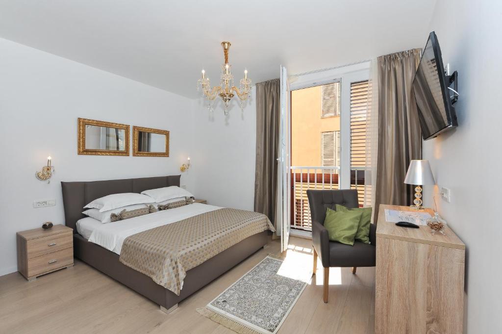 Posteľ alebo postele v izbe v ubytovaní Luka Residence Apartments