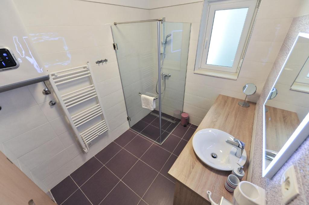 Kúpeľňa v ubytovaní Luka Residence Apartments