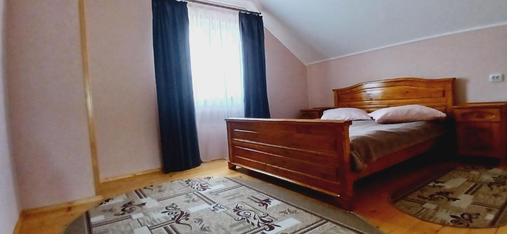 Postel nebo postele na pokoji v ubytování На Пагорбі