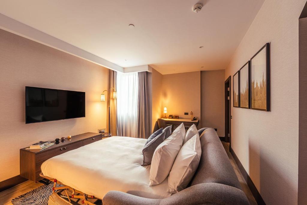 Een TV en/of entertainmentcenter bij The Fellows House Cambridge, Curio Collection By Hilton
