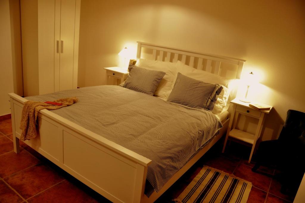 Postel nebo postele na pokoji v ubytování Apartmány U Vavřince