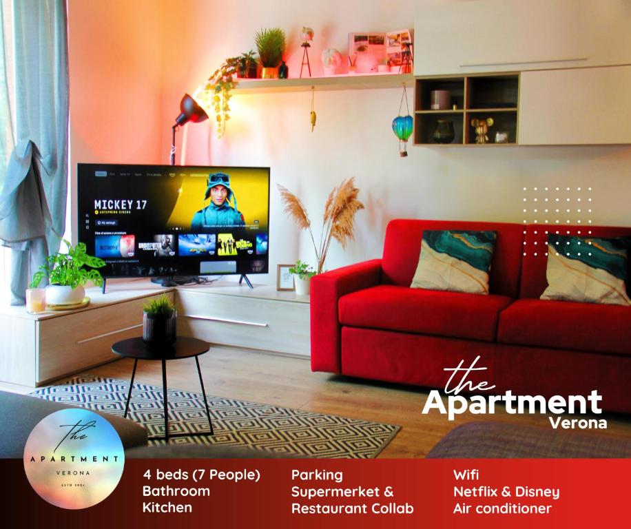 TV a/nebo společenská místnost v ubytování The Apartment Verona - in exclusive collaboration with restaurant