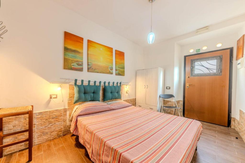 Postel nebo postele na pokoji v ubytování Alloggio Turistico 103