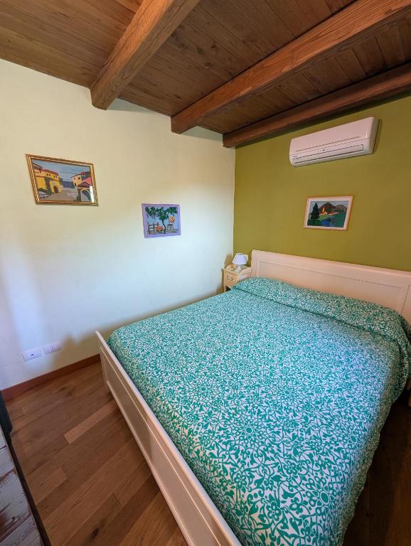 Postel nebo postele na pokoji v ubytování Le Rocche Valnerina Residence