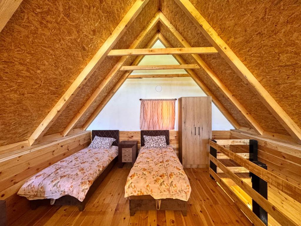 Postel nebo postele na pokoji v ubytování Household Ušćumlić - Oaza mira