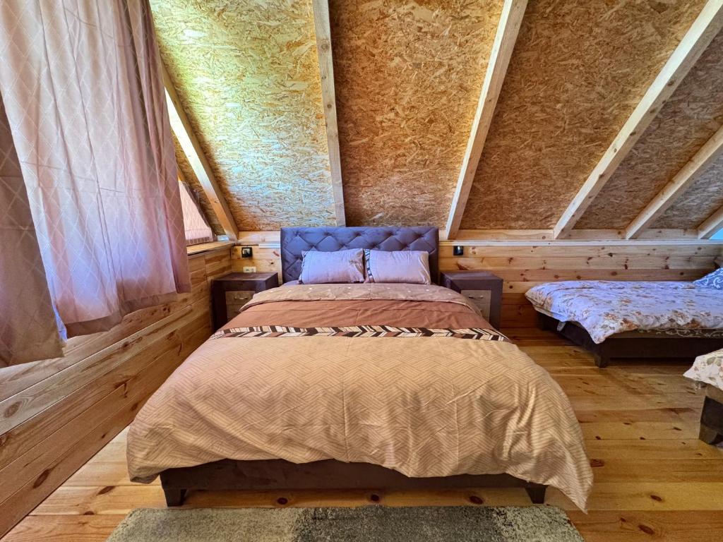 Postel nebo postele na pokoji v ubytování Household Ušćumlić - Oaza mira