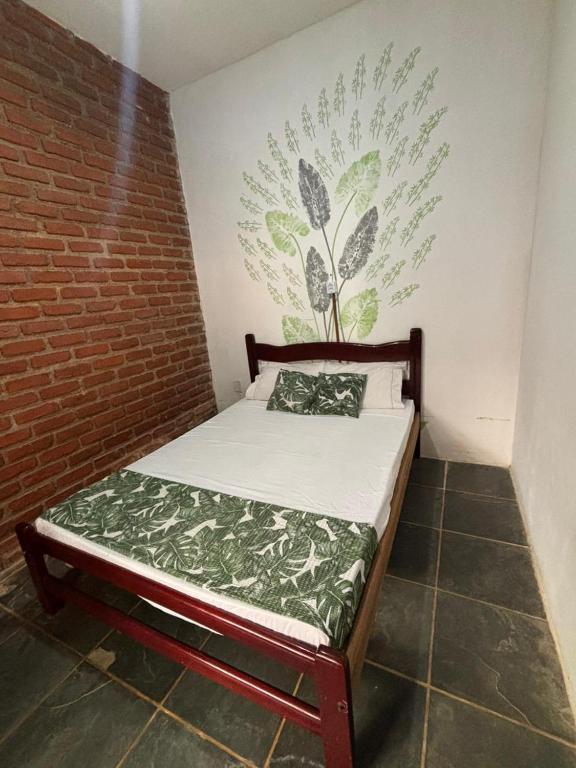 Postel nebo postele na pokoji v ubytování Cacau Biruta