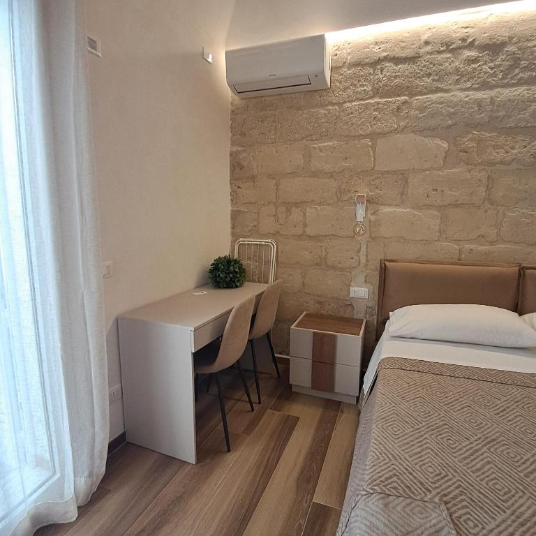 Postel nebo postele na pokoji v ubytování La dimora del vento