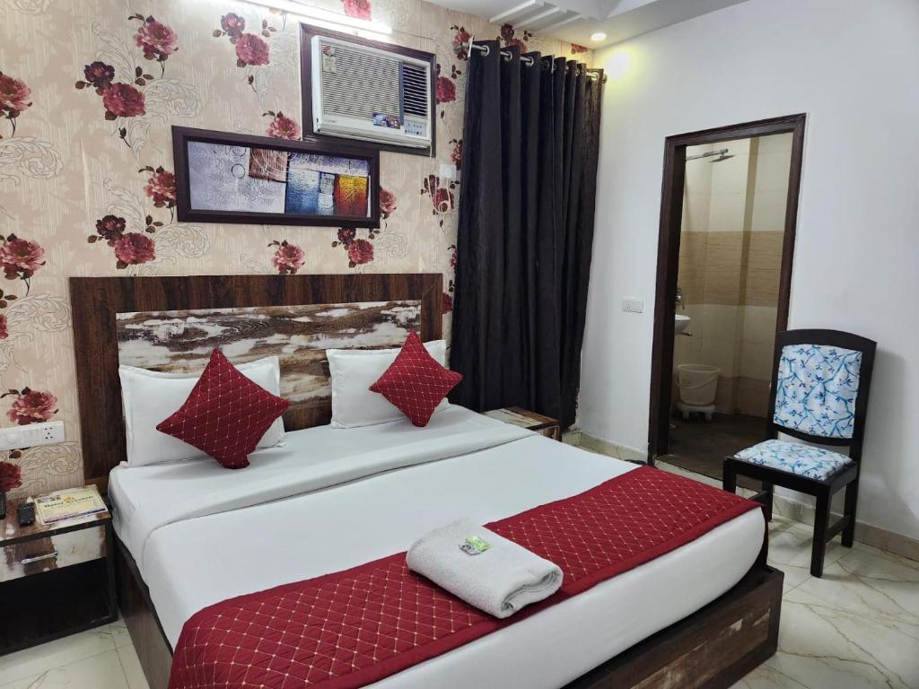 Postel nebo postele na pokoji v ubytování Hotel Grand Marina