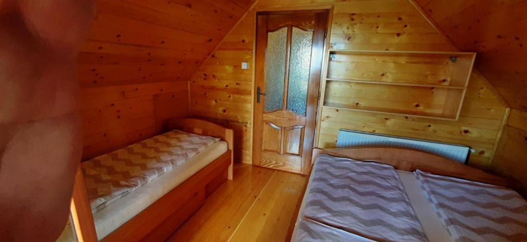 Letto o letti in una camera di Tri Srca
