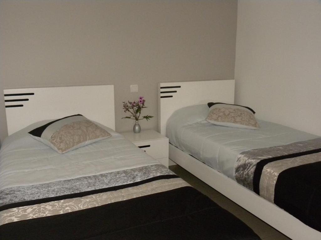 Postel nebo postele na pokoji v ubytování Casa Alto da Ladeira