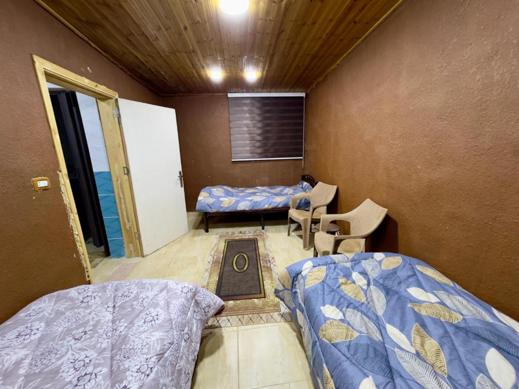 Voodi või voodid majutusasutuse شاليه الريف - البحر الميت - النهضة Chalet Al-Reef - DeadSea - Al-Nahda toas