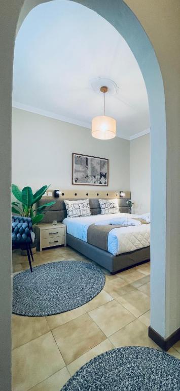 Postel nebo postele na pokoji v ubytování Semiramis Guesthouse