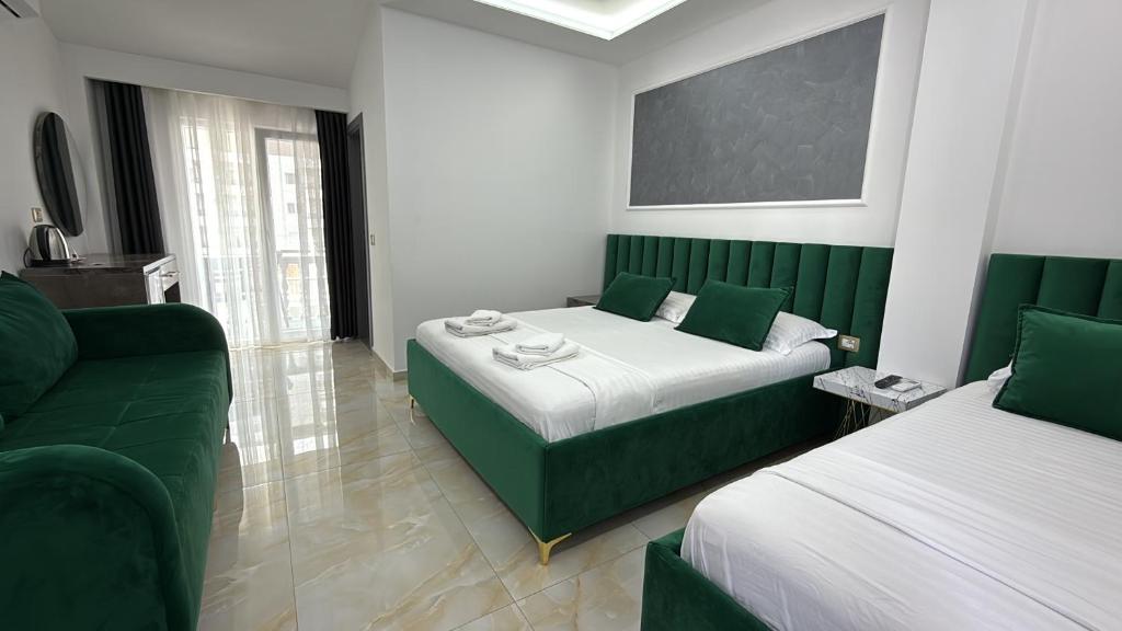 Postel nebo postele na pokoji v ubytování Hotel Leodori 1