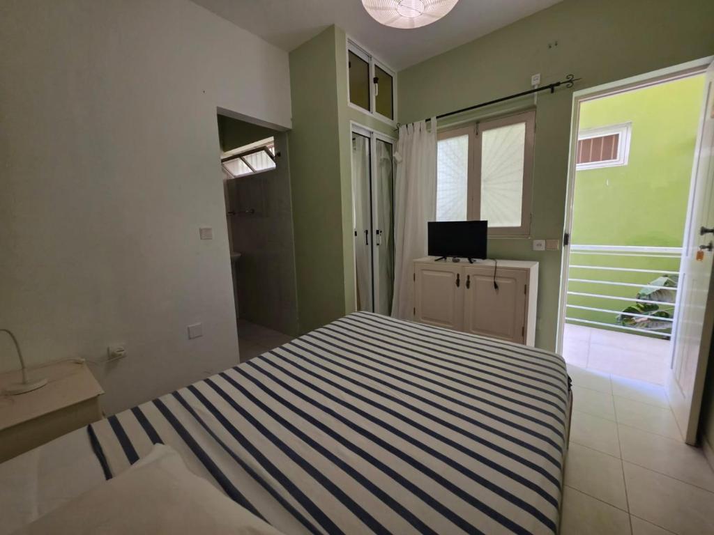 Postel nebo postele na pokoji v ubytování Residencial Raiar
