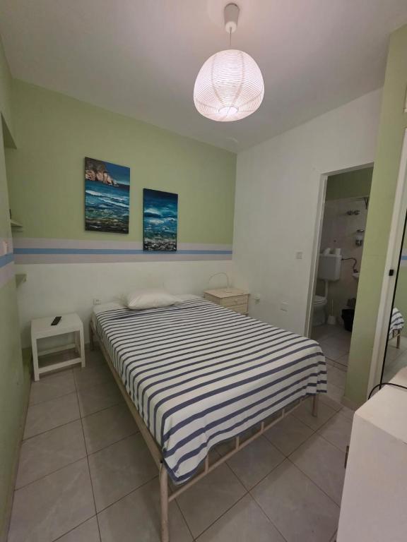 Postel nebo postele na pokoji v ubytování Residencial Raiar