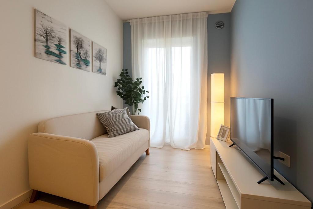 Μια τηλεόραση ή/και κέντρο ψυχαγωγίας στο Intero Apt Padova - Free Parking - WiFi - Aria Condizionata - Oasi Padova