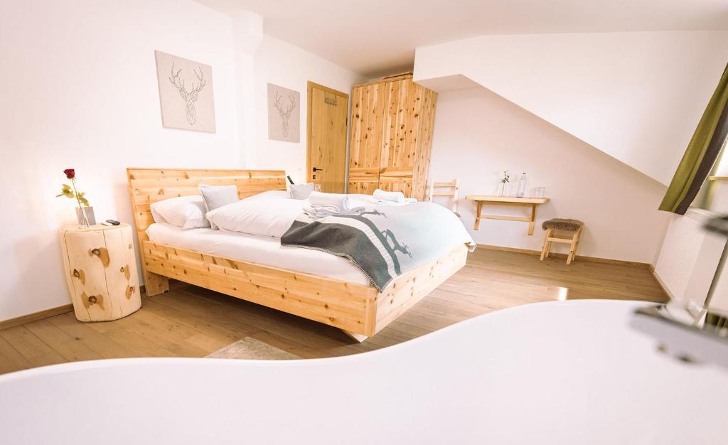 Postel nebo postele na pokoji v ubytování Landgasthof Rechenwirt