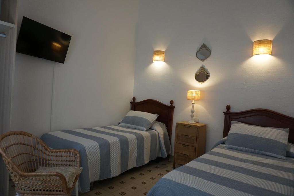 Posteľ alebo postele v izbe v ubytovaní Montserrat Casa del Mar