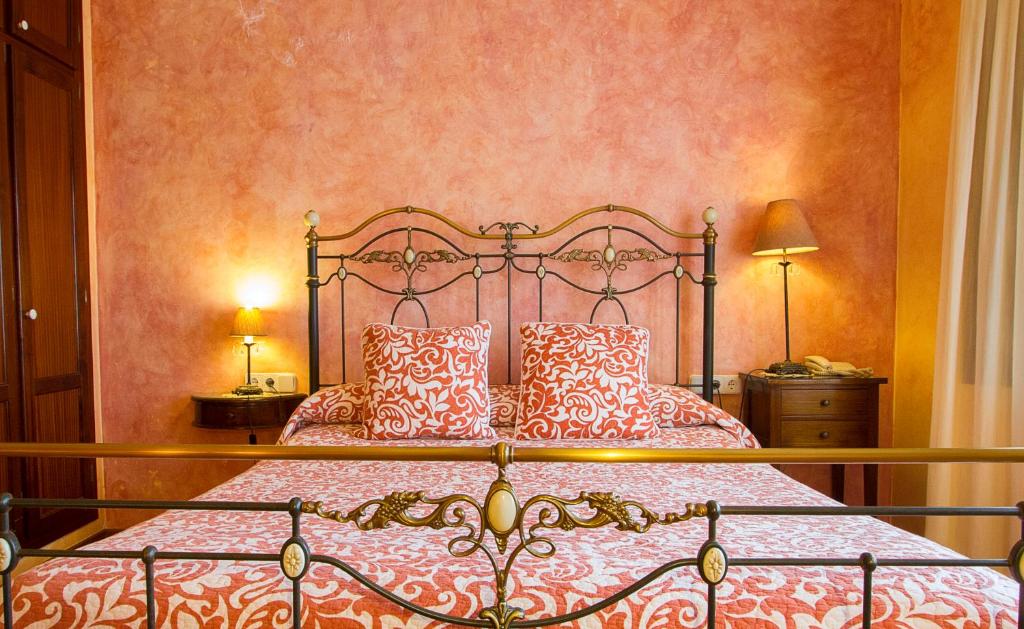 Postel nebo postele na pokoji v ubytování Hotel Antiga