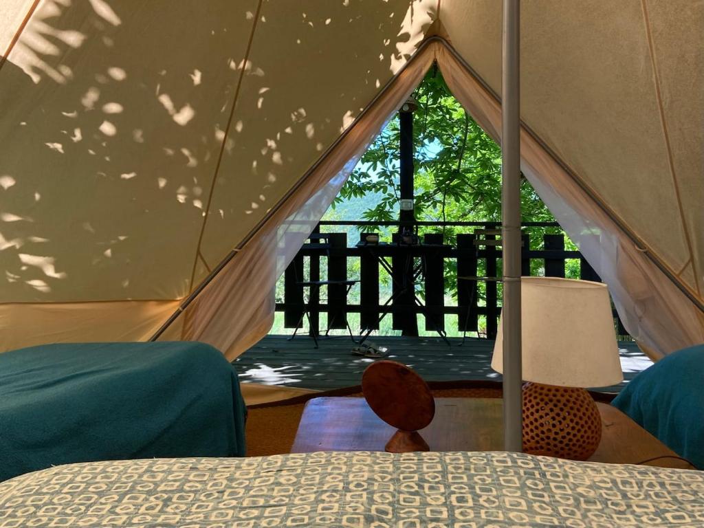 Postel nebo postele na pokoji v ubytování Podere di Maggio - Glamping tent 2
