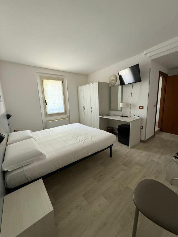 Posteľ alebo postele v izbe v ubytovaní Hotel Bel Sito Peschiera