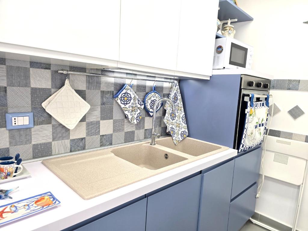 Kuchyň nebo kuchyňský kout v ubytování Starview Apartment - Comfy Apt by the center