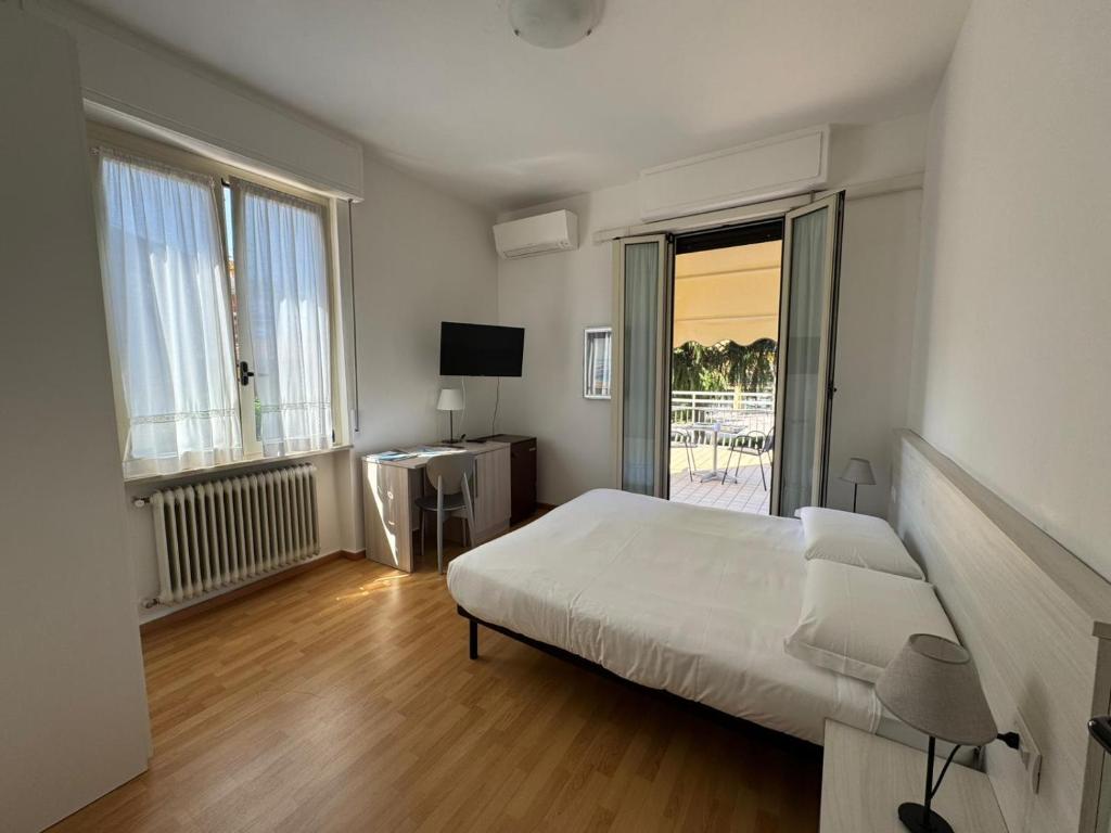 Posteľ alebo postele v izbe v ubytovaní Hotel Bel Sito Peschiera
