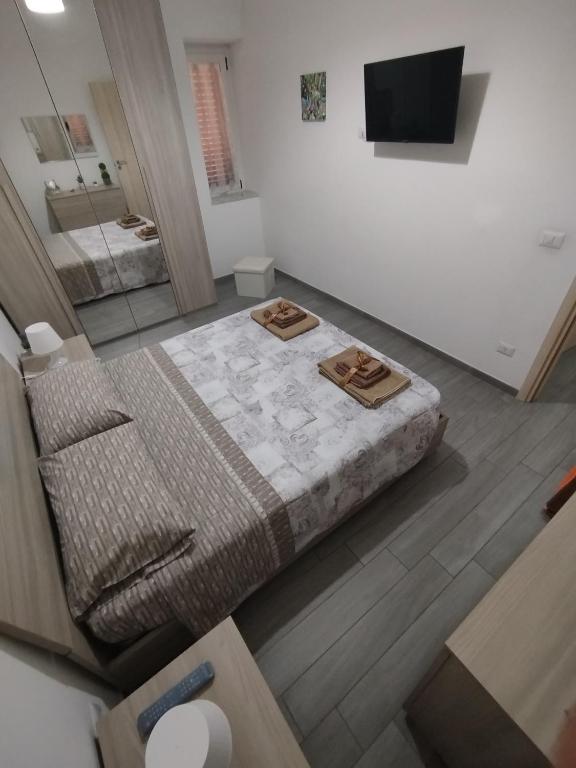 Postel nebo postele na pokoji v ubytování CAMARDA HOME