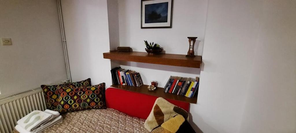 Postel nebo postele na pokoji v ubytování Apartman Domacinstvo La ViE na selu