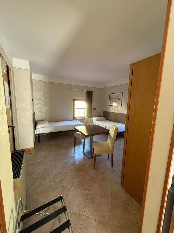 Posteľ alebo postele v izbe v ubytovaní Hotel Bel Sito Peschiera