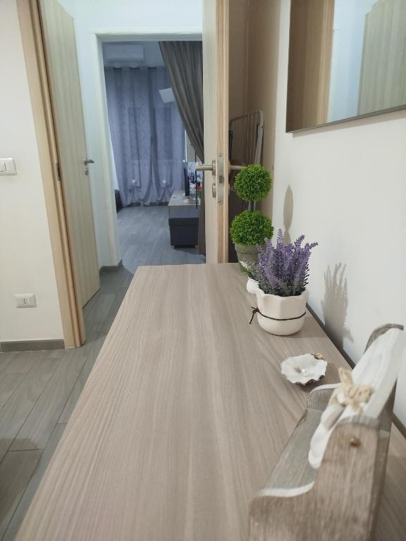 Postel nebo postele na pokoji v ubytování CAMARDA HOME
