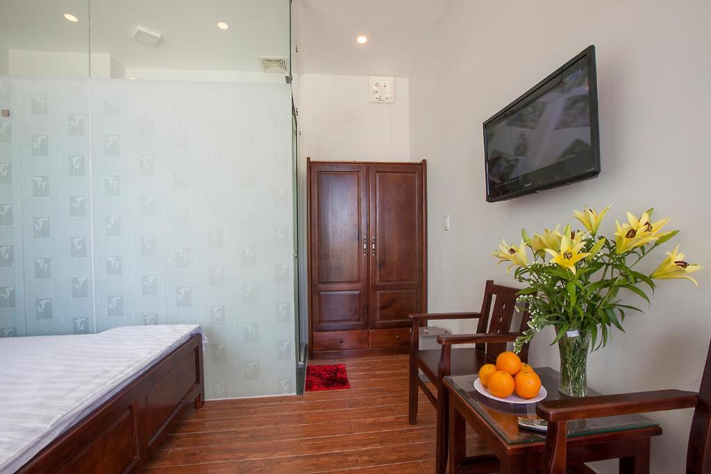 Giường trong phòng chung tại Phuong Nam Guest House