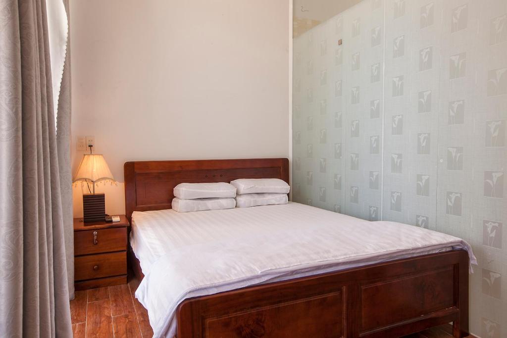 Giường trong phòng chung tại Phuong Nam Guest House