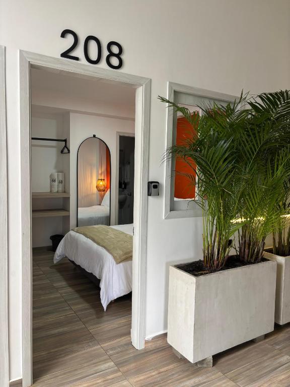 Postel nebo postele na pokoji v ubytování HotelTumbaga88