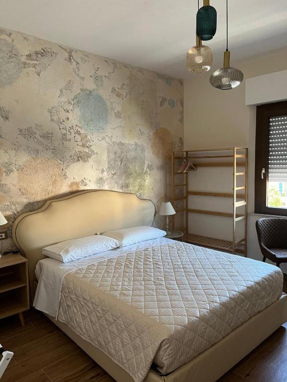 Postel nebo postele na pokoji v ubytování BnB Montepulciano