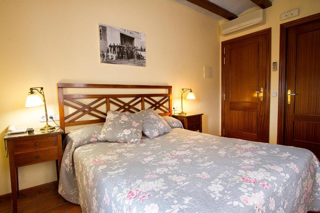 Postel nebo postele na pokoji v ubytování Hotel Antiga