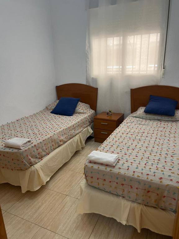 Postel nebo postele na pokoji v ubytování Marina Dor Oropesa Apt 1 Linea