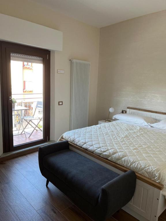 Postel nebo postele na pokoji v ubytování BnB Montepulciano