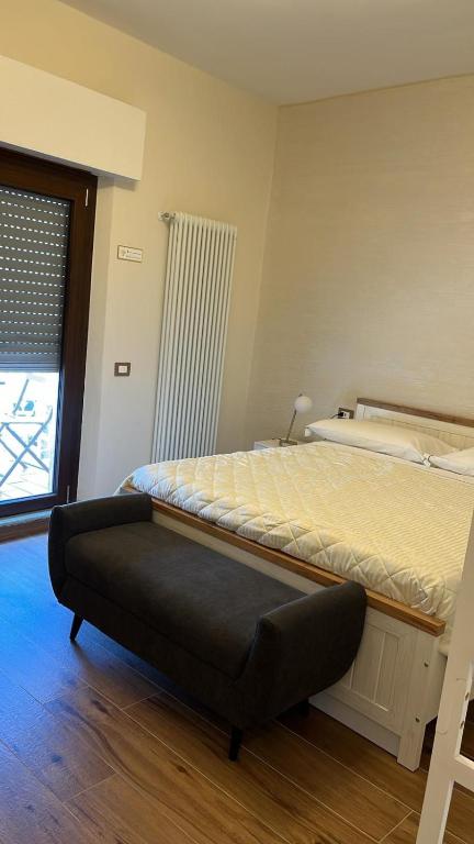 Postel nebo postele na pokoji v ubytování BnB Montepulciano
