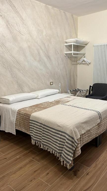 Postel nebo postele na pokoji v ubytování BnB Montepulciano