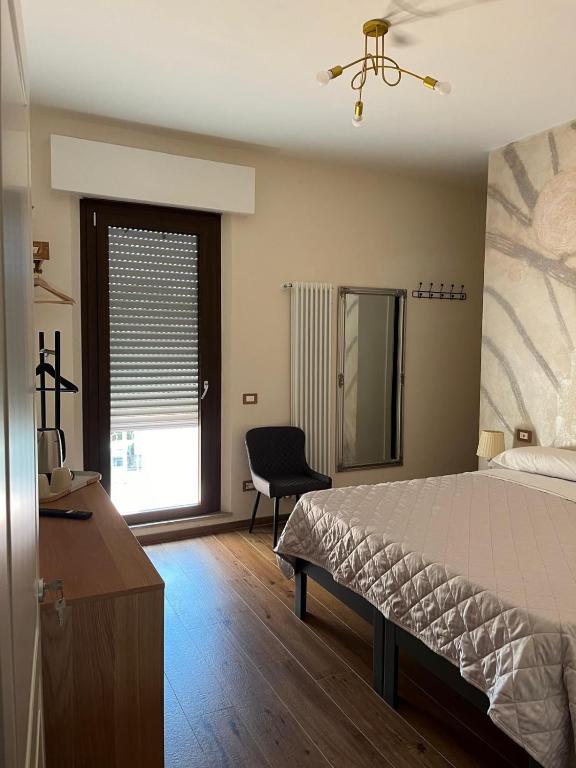 Postel nebo postele na pokoji v ubytování BnB Montepulciano