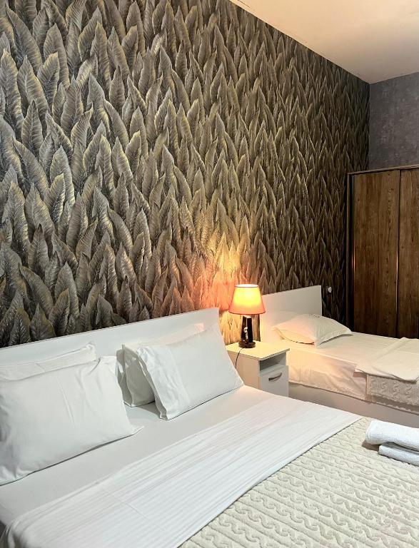 Postel nebo postele na pokoji v ubytování Hotel 6