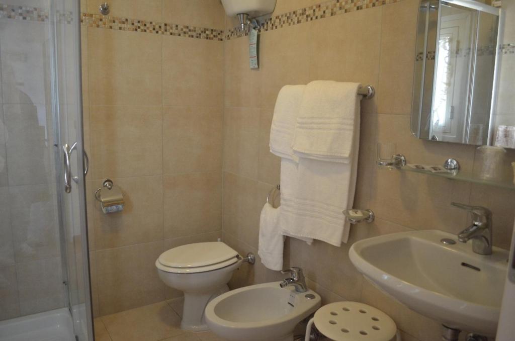 Koupelna v ubytování Hotel Paradiso